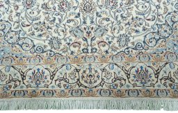 Full view of 2000s Nain rug from Iran / Persia, 292 × 190 cm in Beige tones