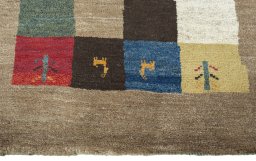 Central medallion detail of 2000s Persian Gabbeh rug from Pakistan