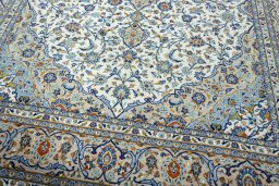 Close-up detail of 2000s Kashan rug from Iran / Persia showing Wool weave