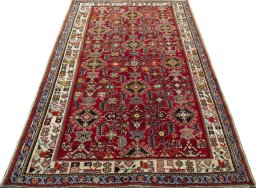 Surface texture of 2000s Shiraz rug with natural Wool and intricate pattern