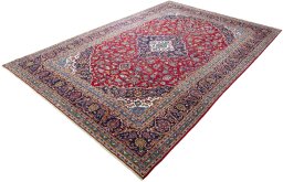 Corner detail of 2000s Kashan rug showing border pattern and Wool pile