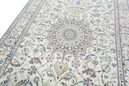 Backside of handmade 2000s Nain rug showing knot structure and weave density