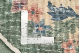 Central medallion detail of 1940s China rug from China