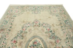 Surface texture of 1970s China rug with natural Wool and intricate pattern