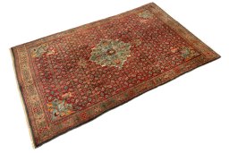 Corner detail of 1920s Bijar rug showing border pattern and Wool pile
