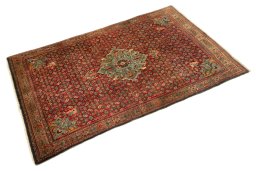Close-up detail of 1920s Bijar rug from Iran / Persia showing Wool weave