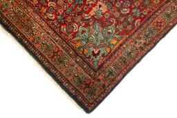 Backside of handmade 1920s Bijar rug showing knot structure and weave density
