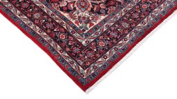 Backside of handmade 1950s Bijar rug showing knot structure and weave density