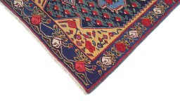 Backside of handmade 1920s Bijar rug showing knot structure and weave density