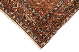 Backside of handmade New Bijar rug showing knot structure and weave density