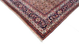 Backside of handmade New Bijar rug showing knot structure and weave density