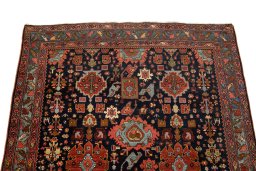 Surface texture of 1900s Bijar rug with natural Wool and intricate pattern