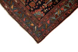 Backside of handmade 1900s Bijar rug showing knot structure and weave density