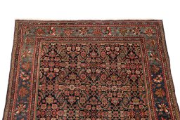 Surface texture of 1920s Bijar rug with natural Wool and intricate pattern