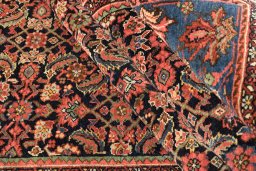 Full view of 1920s Bijar rug from Iran / Persia, 214 × 140 cm in Dark blue tones