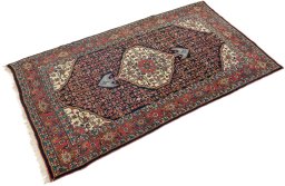 Corner detail of 1920s Bijar rug showing border pattern and Wool pile