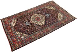 Close-up detail of 1920s Bijar rug from Iran / Persia showing Wool weave