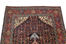 Surface texture of 1920s Bijar rug with natural Wool and intricate pattern