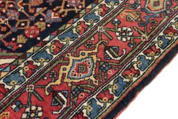 Close-up detail of 1920s Bijar rug from Iran / Persia showing Wool weave