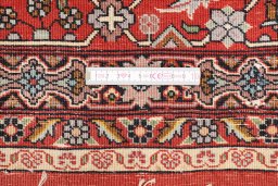 Corner detail of 1990s Bijar rug showing border pattern and Wool pile
