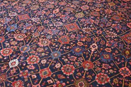 Corner detail of 1930s Bijar rug showing border pattern and Wool pile
