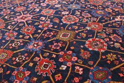 Close-up detail of 1930s Bijar rug from Iran / Persia showing Wool weave