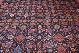 Corner detail of 1930s Bijar rug showing border pattern and Wool pile