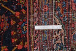Corner detail of 1930s Bijar rug showing border pattern and Wool pile