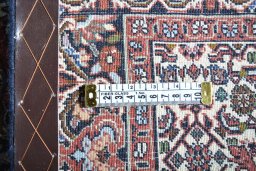 Surface texture of New Bijar rug with natural Cork and intricate pattern