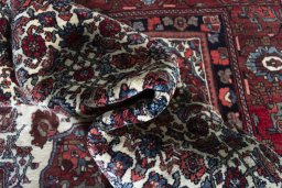 Close-up detail of 1970s Bijar rug from Iran / Persia showing Wool weave