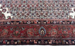 Close-up detail of 1970s Bijar rug from Iran / Persia showing Wool weave