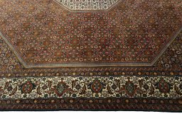 Corner detail of 2000s Bijar rug showing border pattern and Wool pile