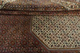 Close-up detail of 2000s Bijar rug from Iran / Persia showing Wool weave