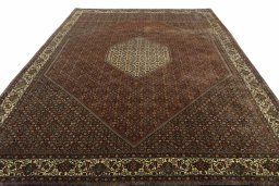 Surface texture of 2000s Bijar rug with natural Wool and intricate pattern