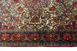 Surface texture of 2000s Bijar rug with natural Cork and intricate pattern