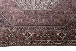 Corner detail of New Bijar rug showing border pattern and Wool pile