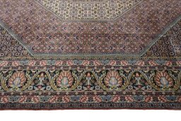 Corner detail of 2000s Bijar rug showing border pattern and Cork pile