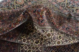 Surface texture of 2000s Bijar rug with natural Cork and intricate pattern