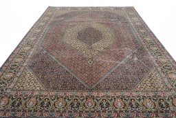 Surface texture of 2000s Bijar rug with natural Cork and intricate pattern