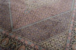 Close-up detail of 2000s Bijar rug from Iran / Persia showing Cork weave