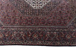 Corner detail of New Bijar rug showing border pattern and Cork pile