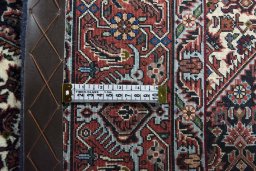 Backside of handmade New Bijar rug showing knot structure and weave density