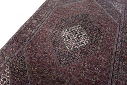Backside of handmade New Bijar rug showing knot structure and weave density