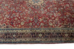 Corner detail of 1970s Bijar rug showing border pattern and Wool pile