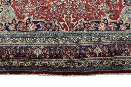 Full view of 1970s Bijar rug from Iran / Persia, 331 × 221 cm in Red tones