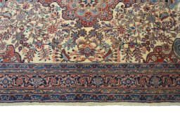 Corner detail of 2000s Bijar rug showing border pattern and Wool pile