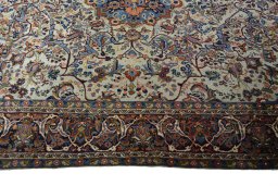 Corner detail of 1970s Bijar rug showing border pattern and Wool pile