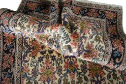 Surface texture of 2000s Bijar rug with natural Wool and intricate pattern