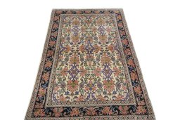 Surface texture of 2000s Bijar rug with natural Wool and intricate pattern