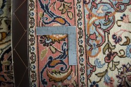Backside of handmade New Bijar rug showing knot structure and weave density